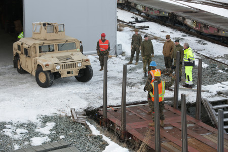 Norwegian officers from their movement control unit supervise the rail operations as U.S. Marines prepare the loading ramp to drive armored vehicles on train cars. Rail cars are one of several transportation options used to move U.S. Marine Corps fighting vehicles and equipment throughout the region. Hell, Norway was the location where HMMWVs and other vehicles were loaded and transported to the location where they would train with the Telemark Battalion.   Cold Response 16 improves capabilities between NATO allies and partners and creates a foundation for future cooperation. This exercise enables the NATO alliance to work together and demonstrate both our unwavering commitment to our collective defense under the North Atlantic Treaty and our ability to counter transnational threats.