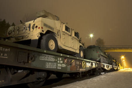 One of several transportation options for moving U.S. Marine Corps fighting vehicles and equipment is by train. Rena, Norway was the location where Light Armored Vehicles were loaded after training with the Telemark Battalion. The crews are now trained and the vehicles have been tested in harsh winter conditions.  They will join the host nation of Norway along with the other 10 participating nations for Exercise Cold Response set to begin on the 29th. The exercise will feature maritime, land, and air operations to underscore NATO's ability to defend against any threat in any environment.  The location in central Norway provides a unique, extreme cold-weather environment for all forces involved to develop tactics, techniques, and procedures and learn from one another.