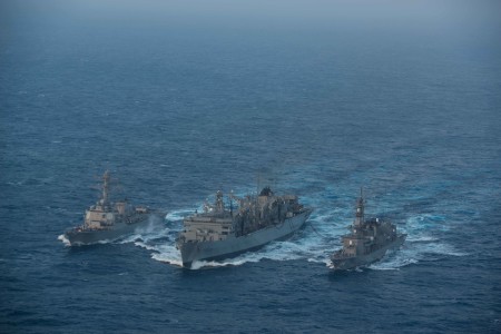 160222-N-BR087-349 PHILIPPINE SEA (Feb. 22, 2016) - Japanese Maritime Self-Defense Force Murasame-class destroyer JDS Samidare (DD-106) and the guided-missile destroyer USS Stockdale (DDG 106) receive an advanced biofuel mixture from the fast combat support ship USNS Rainier (T-AOE 7) during a replenishment at sea. Providing a ready force supporting security and stability in the Indo-Asia-Pacific, the John C. Stennis Strike Group is operating as part of the Great Green Fleet on a regularly scheduled 7th Fleet deployment. (U.S. Navy photo by Mass Communication Specialist Seaman Cole C. Pielop/Released)