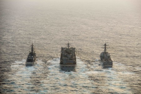 160222-N-BR087-464 PHILIPPINE SEA (Feb. 22, 2016) - Japanese Maritime Self-Defense Force Murasame-class destroyer JDS Samidare (DD-106) and the guided-missile destroyer USS Stockdale (DDG 106) receive an advanced biofuel mixture from the fast combat support ship USNS Rainier (T-AOE 7) during a replenishment at sea. Providing a ready force supporting security and stability in the Indo-Asia-Pacific, the John C. Stennis Strike Group is operating as part of the Great Green Fleet on a regularly scheduled 7th Fleet deployment. (U.S. Navy photo by Mass Communication Specialist Seaman Cole C. Pielop/Released)