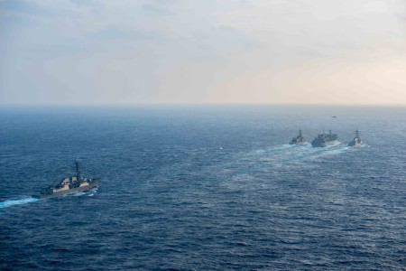 160222-N-BR087-623 PHILIPPINE SEA (Feb. 22, 2016) - Japanese Maritime Self-Defense Force Murasame-class destroyer JDS Samidare (DD-106) and the guided-missile destroyer USS Stockdale (DDG 106) receive an advanced biofuel mixture from the fast combat support ship USNS Rainier (T-AOE 7) during a replenishment at sea while the guided-missile destroyer USS Chung-Hoon (DDG 93) approaches from behind. Providing a ready force supporting security and stability in the Indo-Asia-Pacific, the John C. Stennis Strike Group is operating as part of the Great Green Fleet on a regularly scheduled 7th Fleet deployment. (U.S. Navy photo by Mass Communication Specialist Seaman Cole C. Pielop/Released)