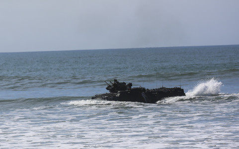 An amphibious assault vehicle moves ashore during the amphibious landing exercise (PHIBLEX) for Exercise Iron Fist 2016, Feb. 26, 2016. This bilateral amphibious training exercise between the U.S. Marine Corps and the Japan Ground Self Defense Force provides Marines and sailors’ valuable training with warriors from another culture, and builds operational amphibious capability between the U.S. and Japanese militaries.  (U.S. Marine Corps photo by Cpl. April L. Price/Released)