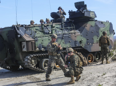 Marines with 1st Battalion, 4th Marine Regiment, and 3d Assault Amphibian Battalion,1st Marine Division, I Marine Expeditionary Force, check their communication connections during a scenario-based, battalion-sized amphibious landing exercise (PHIBLEX) for Exercise Iron Fist 2016, Feb. 26, 2016. Iron Fist is an annual, bilateral amphibious training exercise designed to improve USMC and JGSDF’s ability to plan, communicate and conduct combined amphibious operations at the platoon, company and battalion levels. (U.S. Marine Corps photo by Cpl. April L. Price/Released)